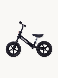 Black New Speed balance bike full side view, steel frame with white logo, five-spoke plastic rims and adjustable saddle post