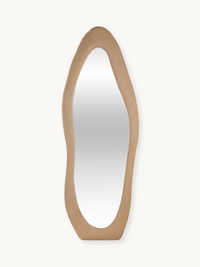 Seraphina full-length asymmetric mirror with wide taupe suede velvet frame, front view on white background