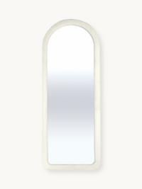 Full-length arched mirror with thick cream teddy fabric frame, front view on plain background