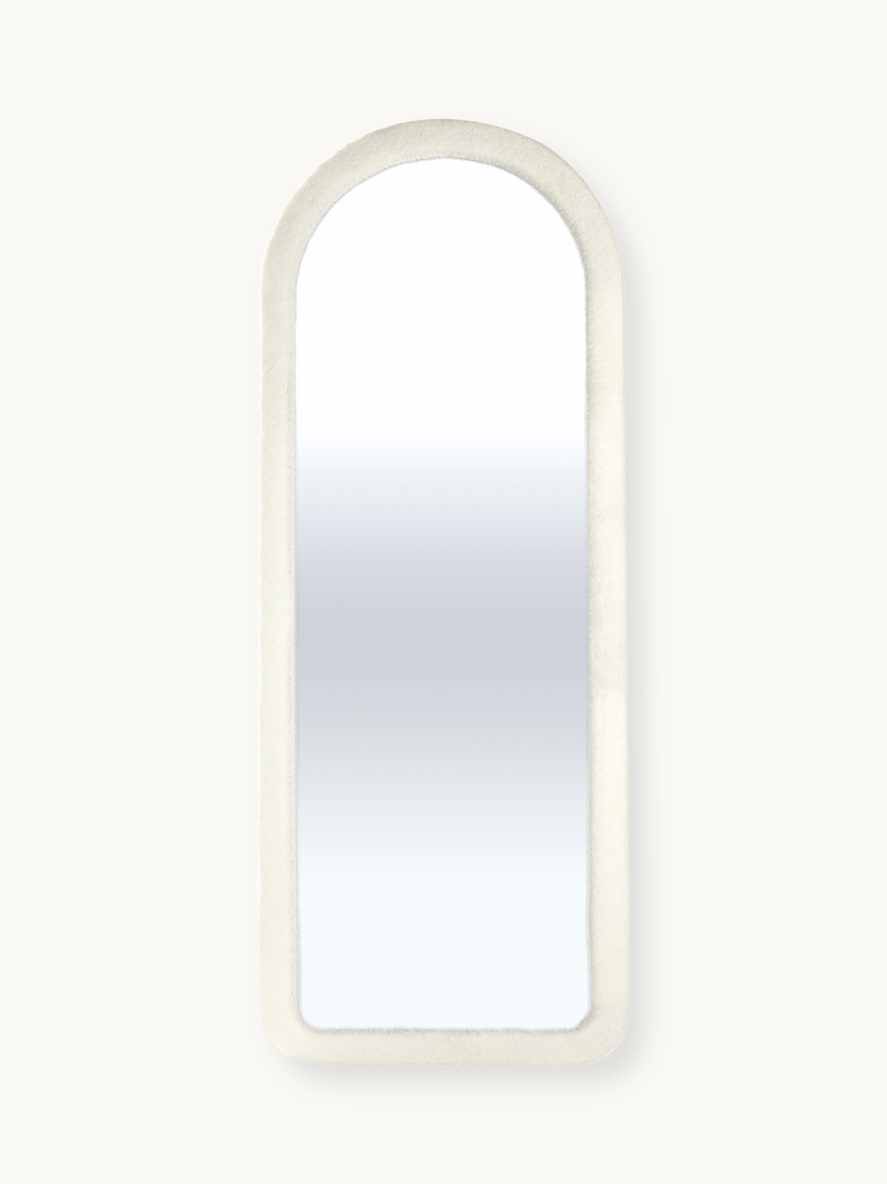 Full-length arched mirror with thick cream teddy fabric frame, front view on plain background