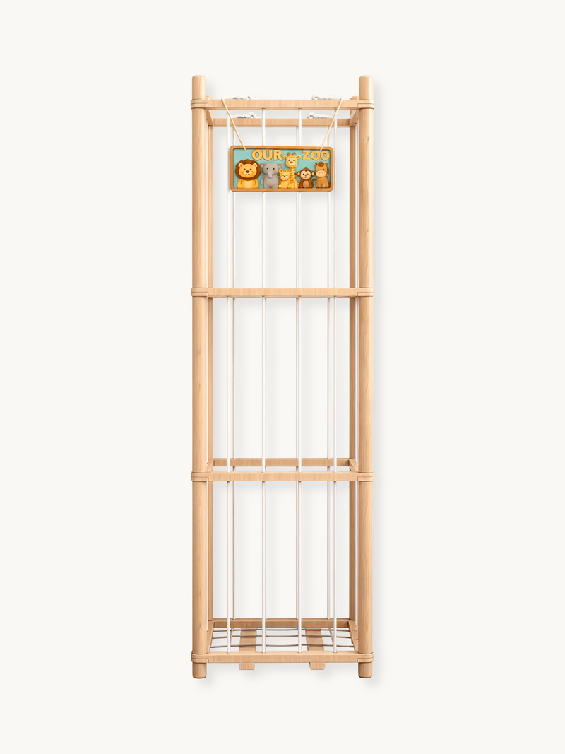 Tall natural pine cage-style stuffed animal storage tower with white cord rails and an "Our Zoo" animal sign, front view o…