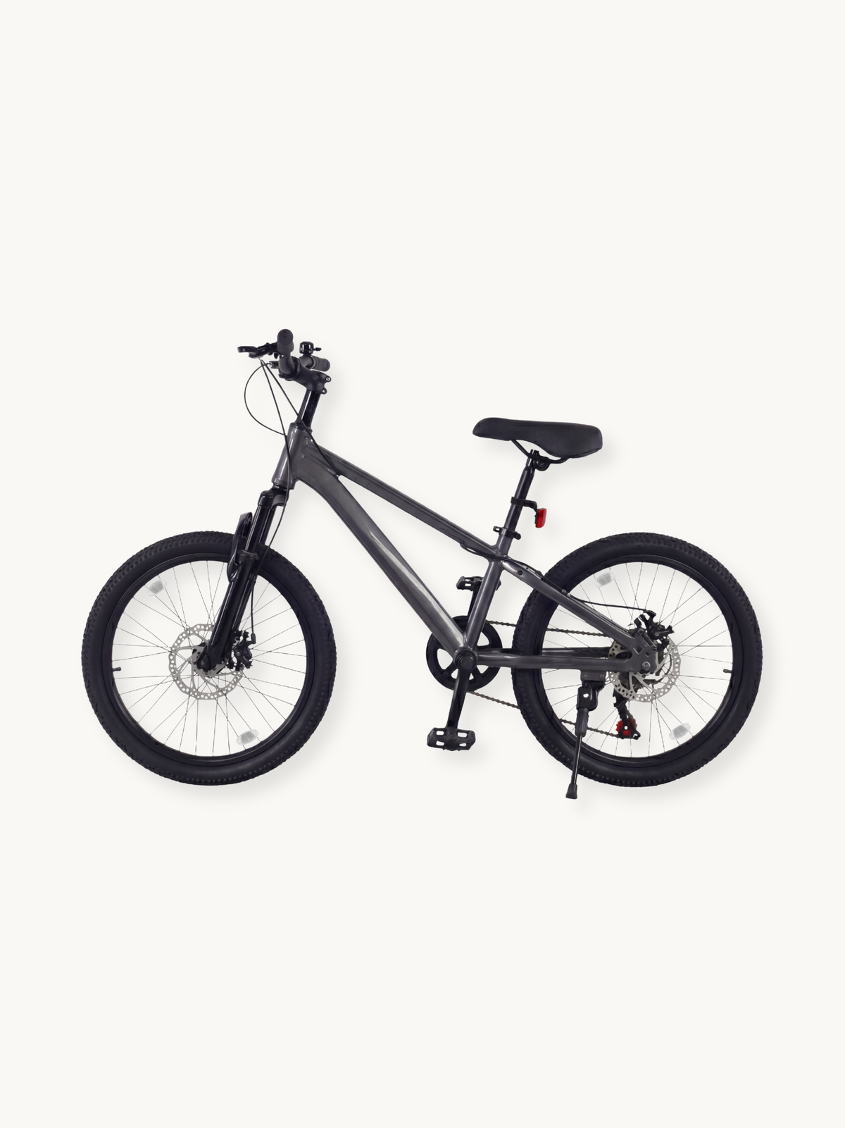 Grey kids' mountain bike, full side view, front suspension fork, dual disc brakes, 20-inch knobby tyres, black saddle, kic…