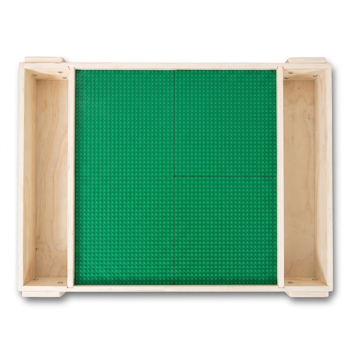 Overhead view of natural wood kids' play table, empty green building plate inset, two open side storage bins, white backgr…