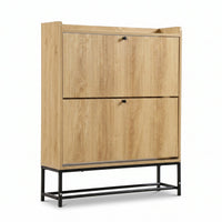Oak-finish shoe cabinet with ribbed flip doors, black round knobs, open top shelf, and black metal frame base, angled view