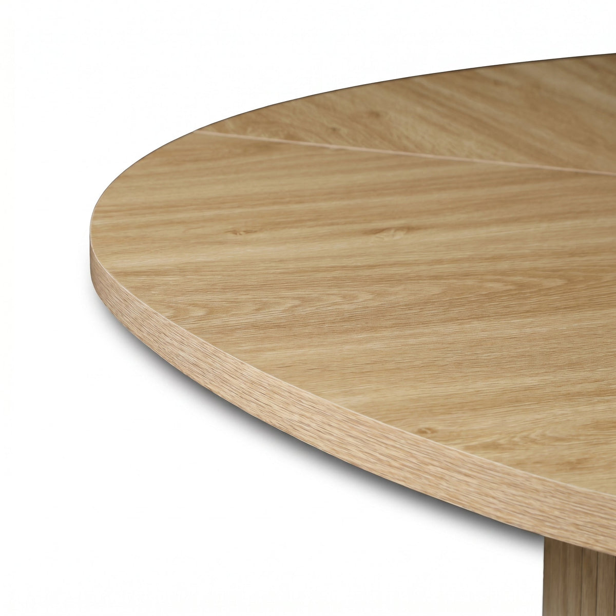 Close-up of rounded edge profile on a natural oak tabletop showing smooth grain texture and thin tabletop thickness
