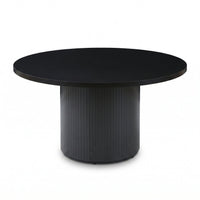 Black round dining table with ribbed cylindrical pedestal base, matte finish, front-facing view on white background