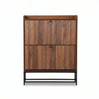 Walnut shoe cabinet front view, two closed flip-down doors with black knobs, raised on slim black metal base, white backgr…