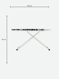 Ironing board with iron rest