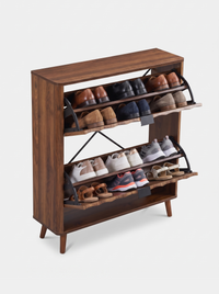 Walnut-finish shoe cabinet with both flip-down compartments open, showing four tiers of stored shoes including sneakers an…