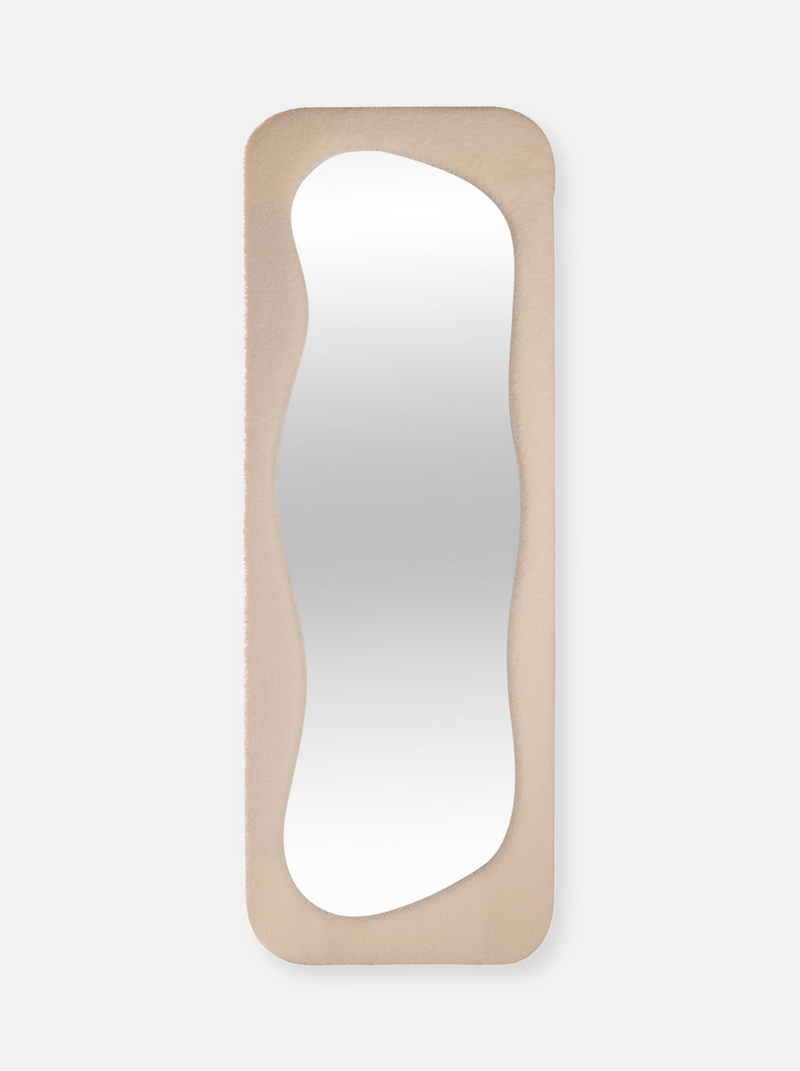Asymmetrical standing mirror Felis with teddy fabric upholstery