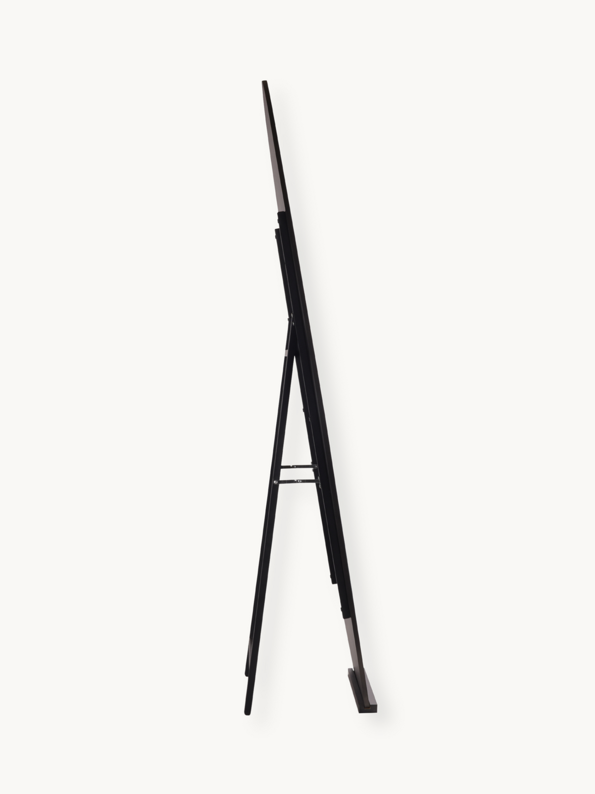 Black asymmetric full-length mirror on easel stand, side profile view showing slim frame depth and A-frame leg spread.