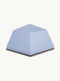 Light blue hexagonal balance stone, large size, angled view showing faceted top and dark non-slip base.
