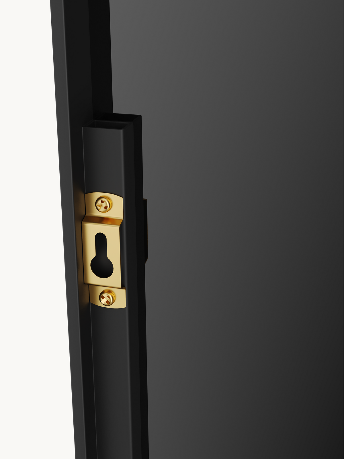 Close-up of gold brass keyhole mounting bracket on the black aluminium frame edge of a full-length mirror
