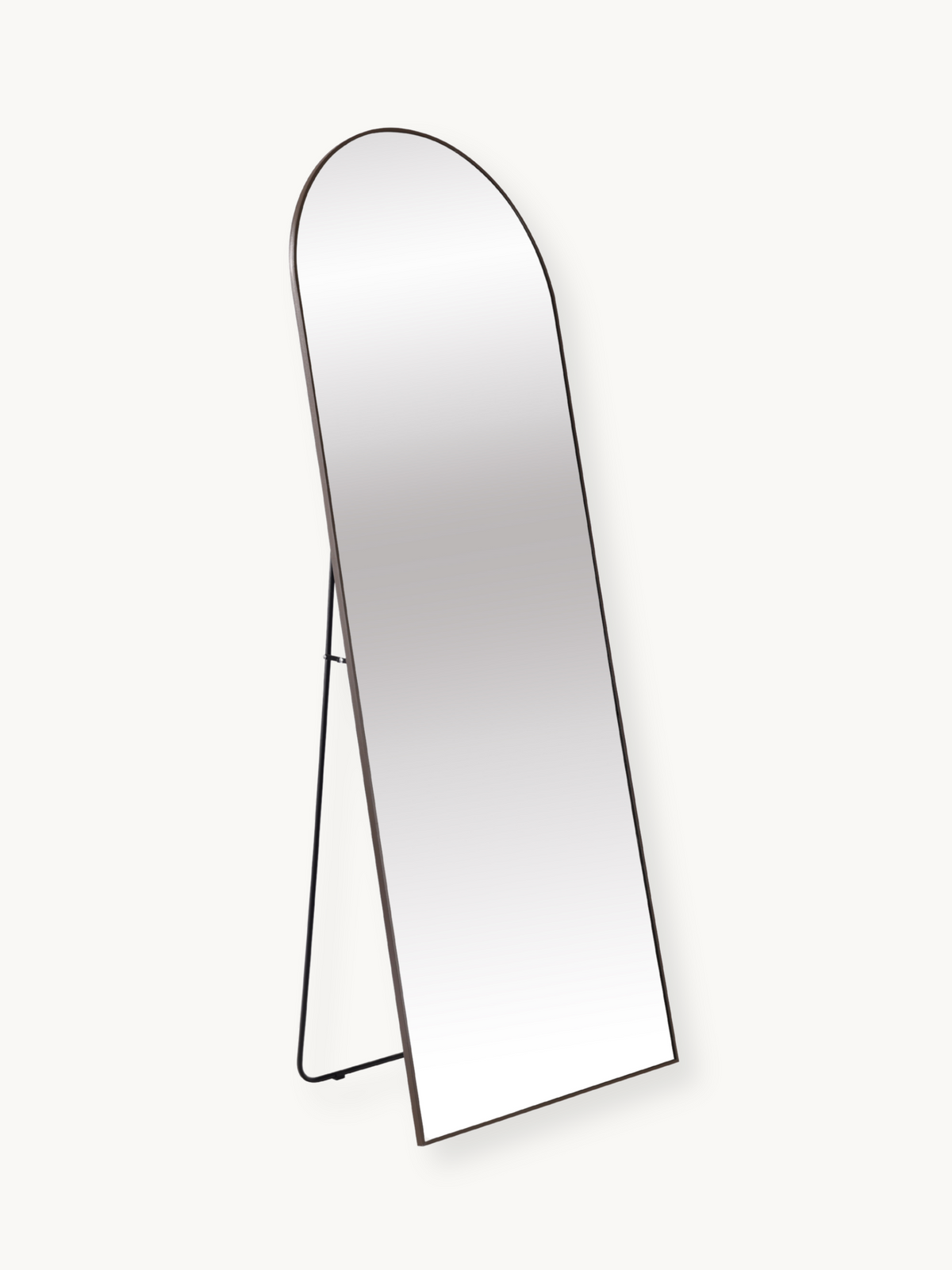 Angled side view of the Eden arched floor mirror, showing thin brown aluminium frame and slim A-frame easel stand