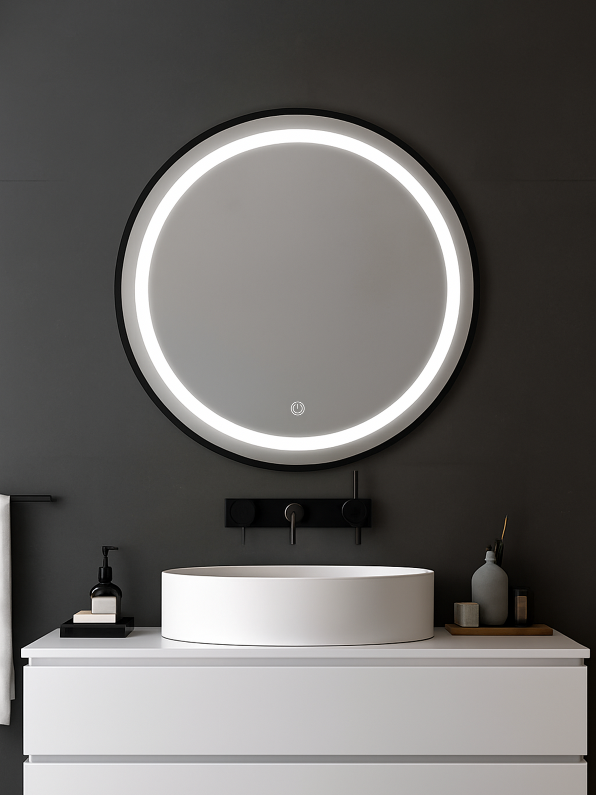 Round LED bathroom mirror with black frame mounted above white vessel sink on dark grey bathroom wall, LED ring lit, lifes…
