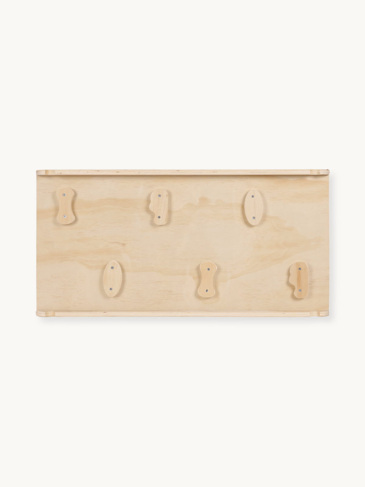 Natural birch wood climbing board panel showing six varied wooden holds screwed onto flat plywood surface, front-on view