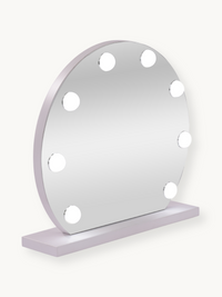 Round white Hollywood vanity mirror with 9 lit LED bulbs, angled three-quarter view showing frame depth and rectangular base
