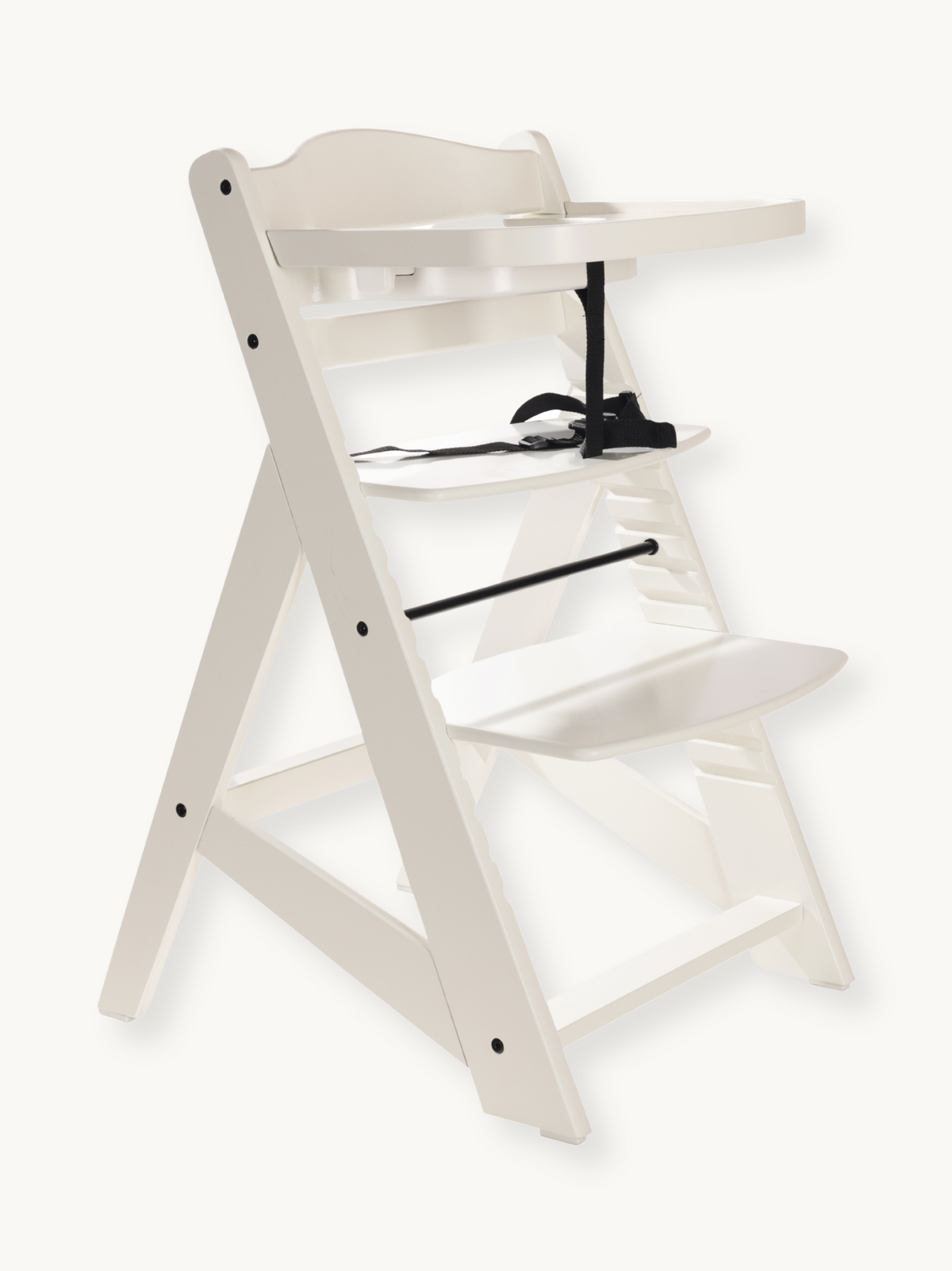 White wooden adjustable baby high chair with removable tray and black safety harness, angled three-quarter view