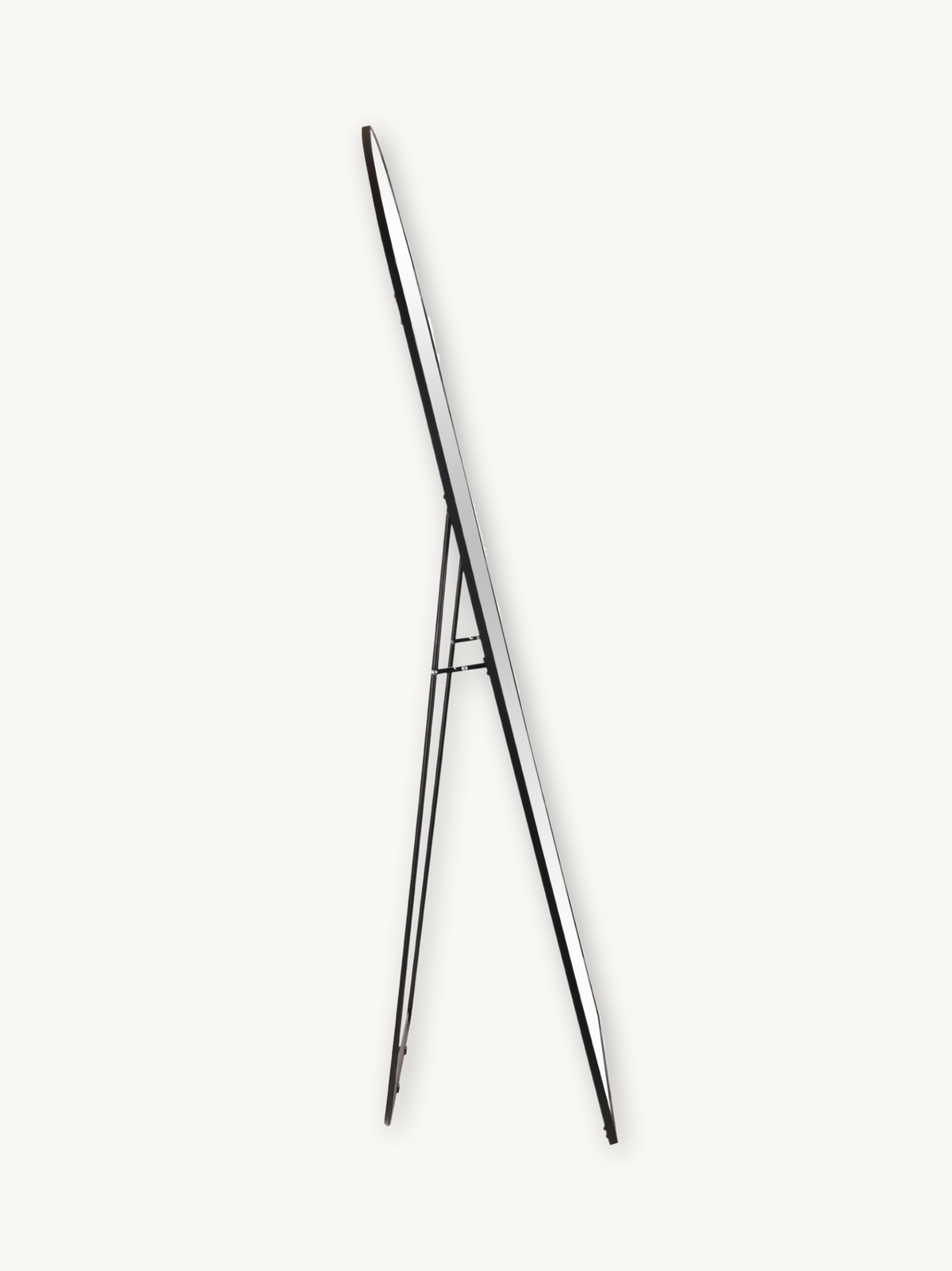 Side profile of black aluminium oval floor mirror on easel stand, showing slim frame depth and A-frame support legs