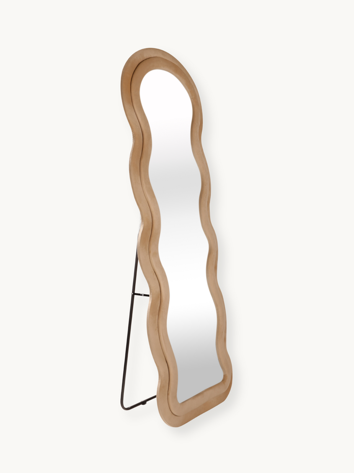 Wavy full-length standing mirror in taupe beige suede velvet with black metal easel stand, angled three-quarter view