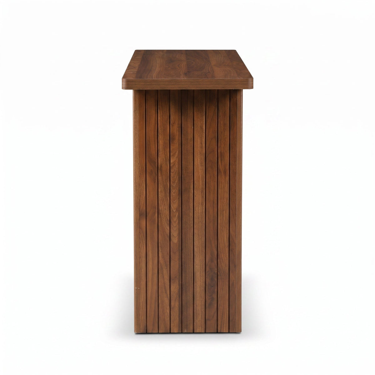 Walnut-finish solid wood console table, side profile view showing vertical ribbed leg panel and flat rectangular top