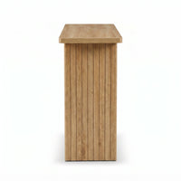 Side profile view of a light oak console table showing vertical ribbed slab legs and flat rectangular top, white background