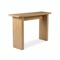 Light oak console table with ribbed slab legs and smooth rectangular top, angled three-quarter view on white background