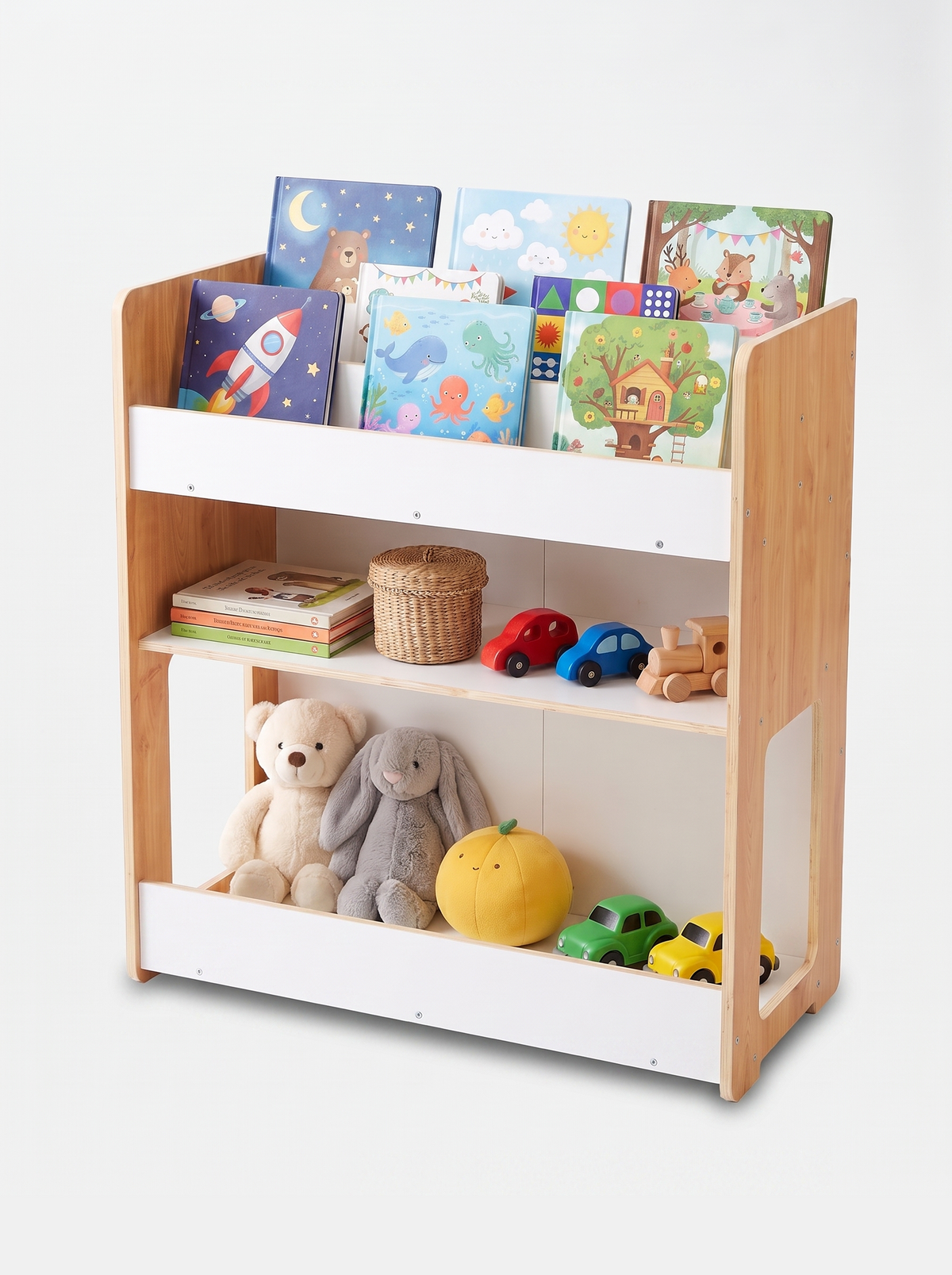 Natural wood and white kids bookcase filled with colourful children's board books on top slots, wooden toy cars, plush ted…