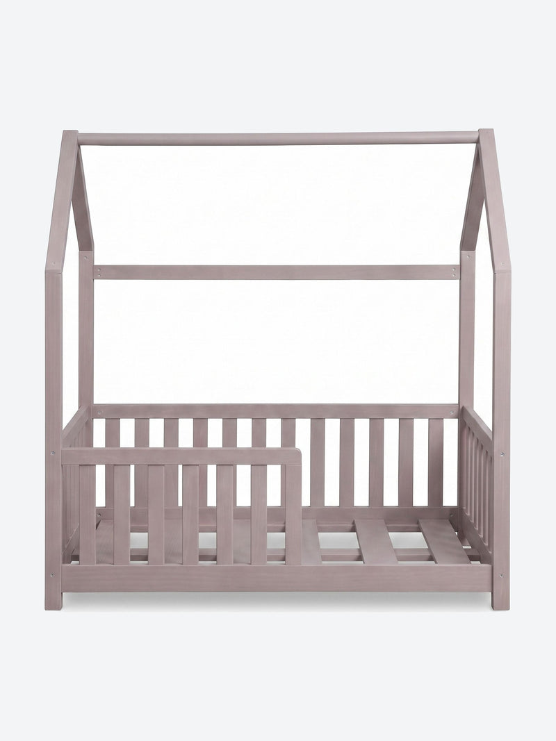 Children's house shaped bed with safety rails