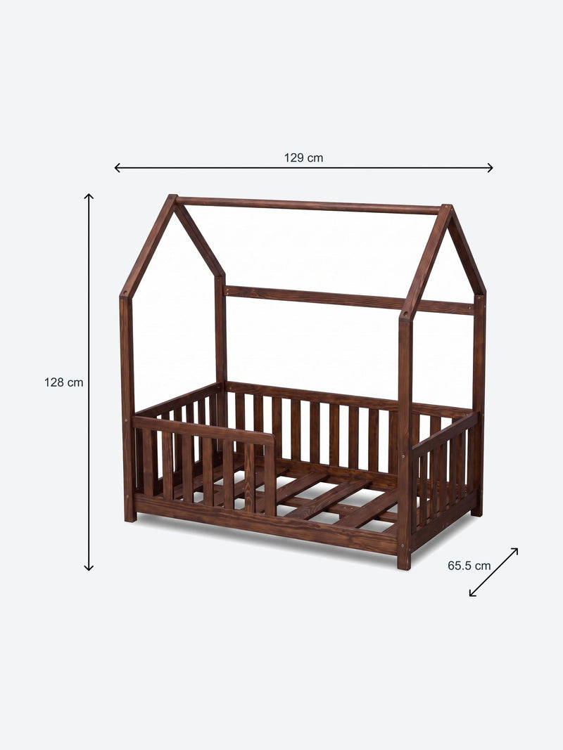 Children's house shaped bed with safety rails