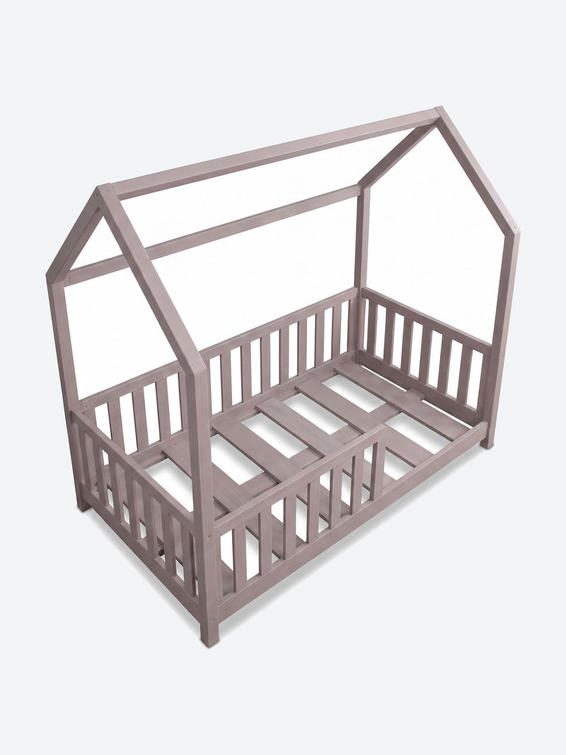 Children's house shaped bed with safety rails