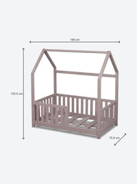 Children's house shaped bed with safety rails