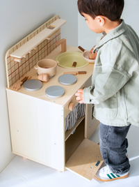 Wooden play kitchen with accessories