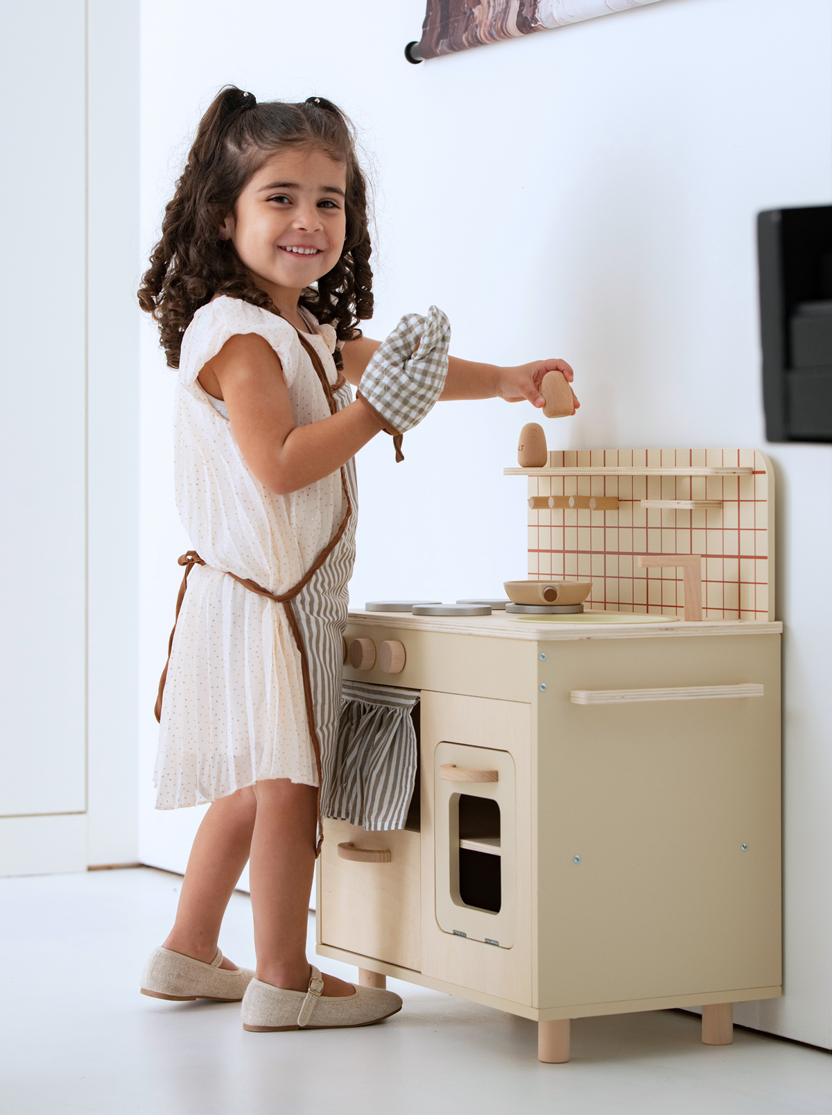 Wooden play kitchen with accessories