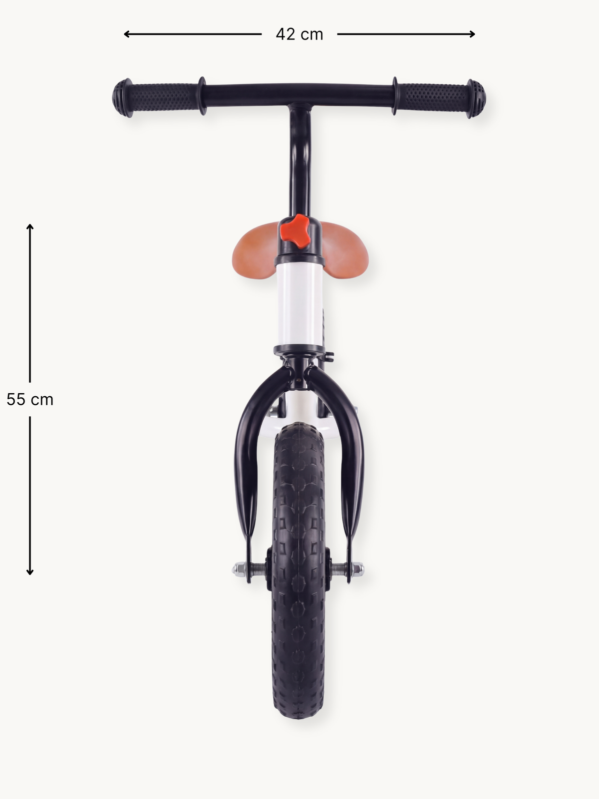 Front view of white balance bike showing 42 cm handlebar width and 55 cm height, black grips, tan saddle, knobbed front tire